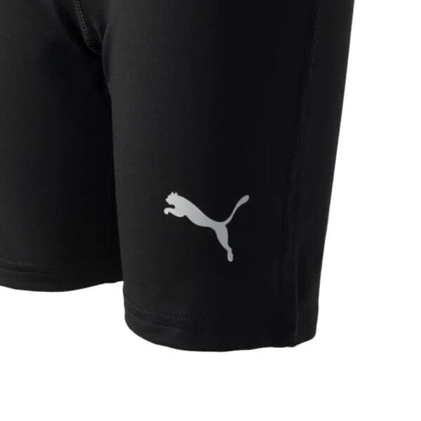 Black Puma athletic shorts with logo.