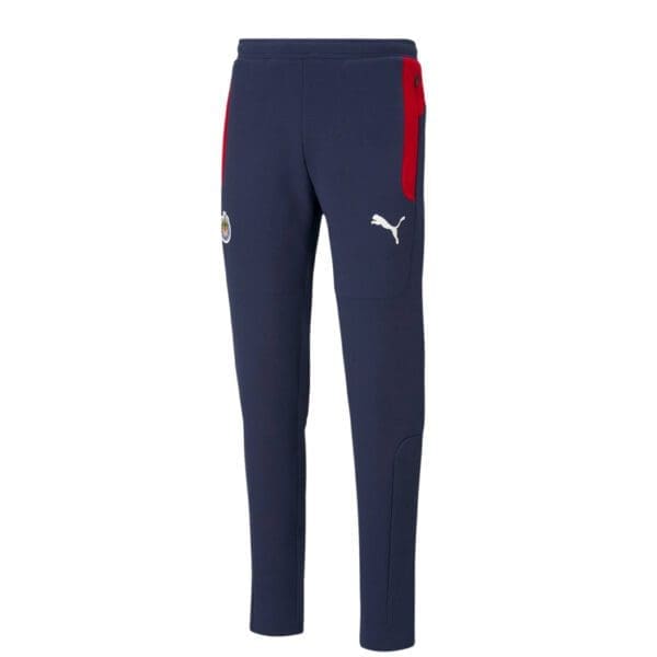 Navy blue Puma training pants with red accents.