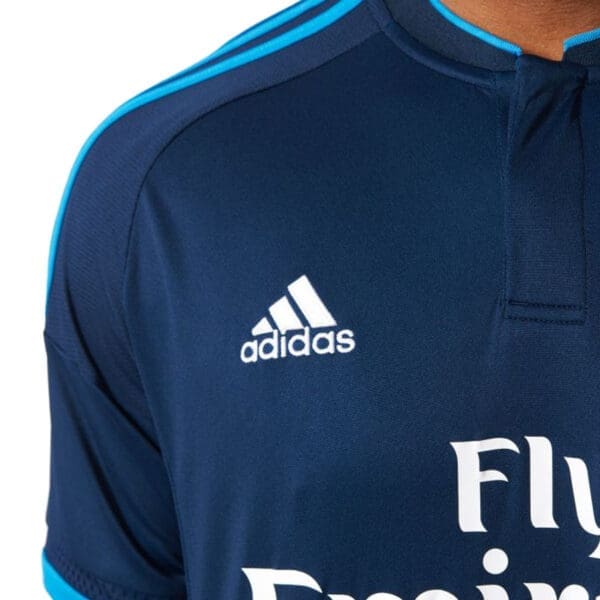 Blue Adidas soccer jersey with white logo.