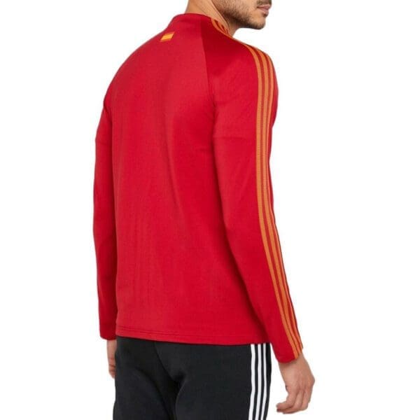 Red long-sleeve shirt with yellow stripes.