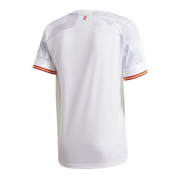 White soccer jersey with red and yellow trim.