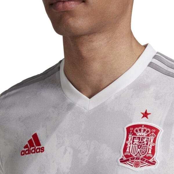 White Adidas Spain soccer jersey with crest.