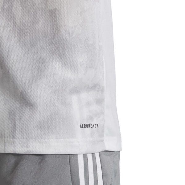 White Adidas Aeroready shirt with camo print.