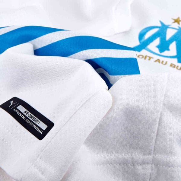 White and blue football jersey with logo.