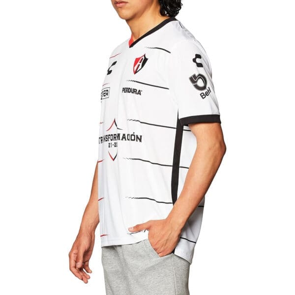 White and black soccer jersey with logo.