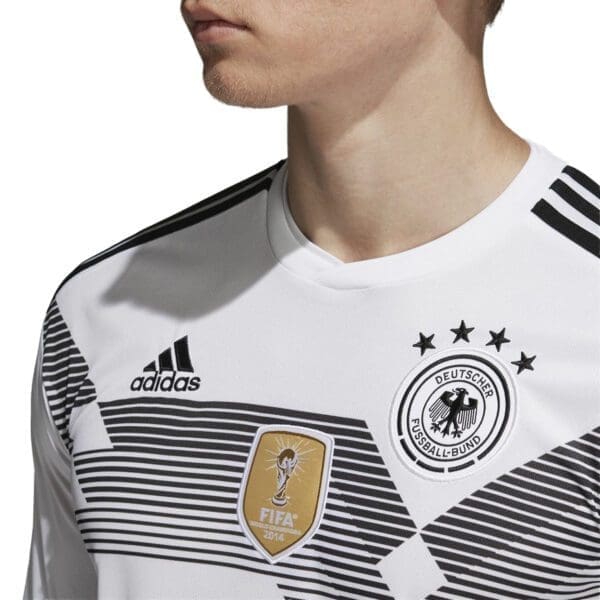 White Germany soccer jersey with Adidas logo.