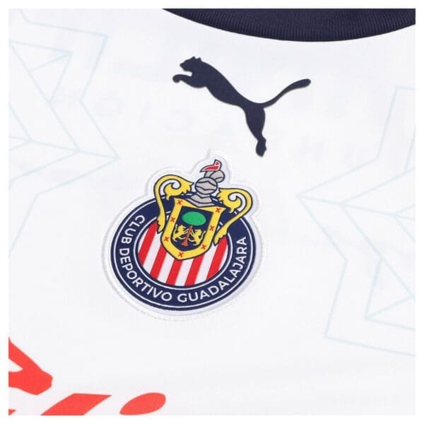 White soccer jersey with team logo and Puma logo.