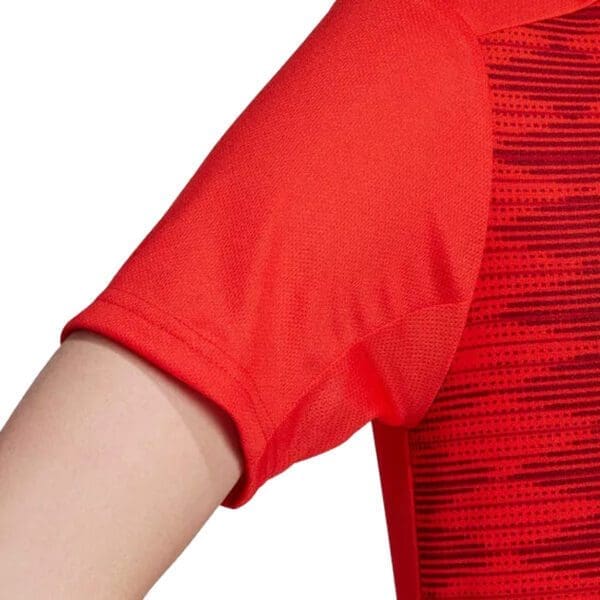 Red short sleeve t-shirt with pattern.