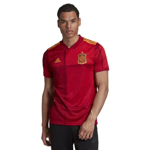 Man wearing Spain's soccer jersey.