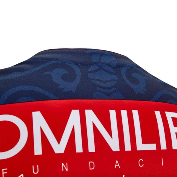 Back of a blue and red jersey with "Omnilife" logo.