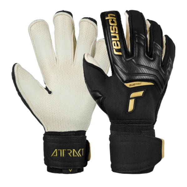 Reusch Attrakt goalkeeper gloves, black and gold.