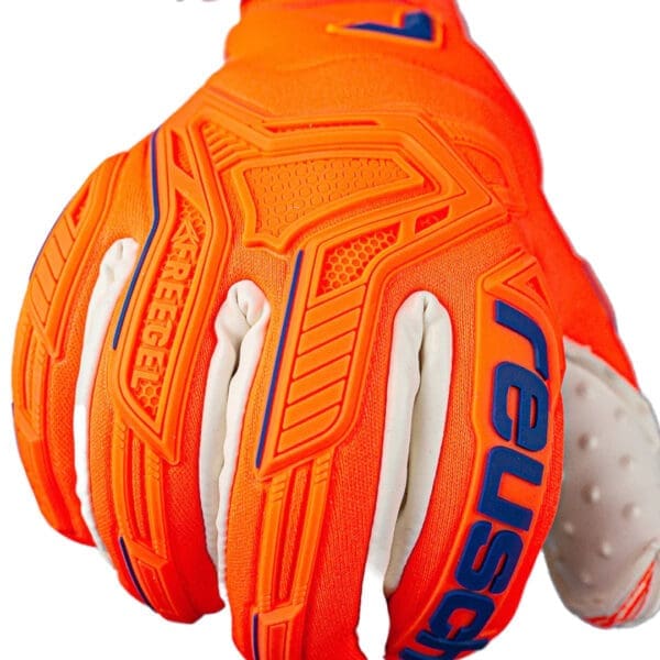 Orange and blue goalkeeper gloves.