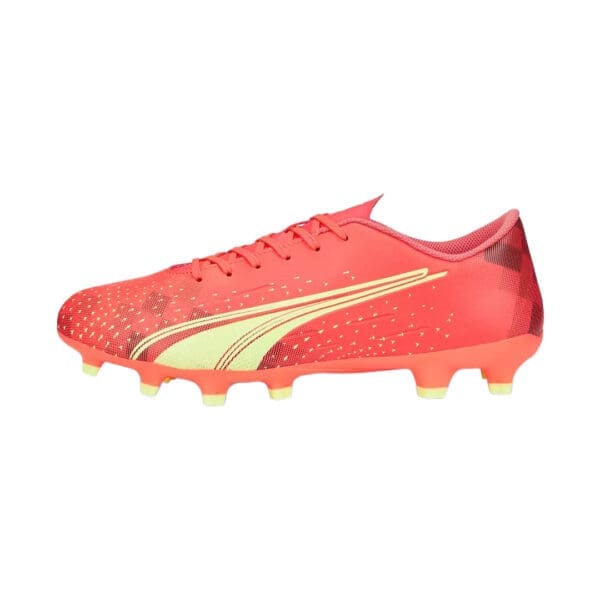 Pink and yellow Puma soccer cleats.