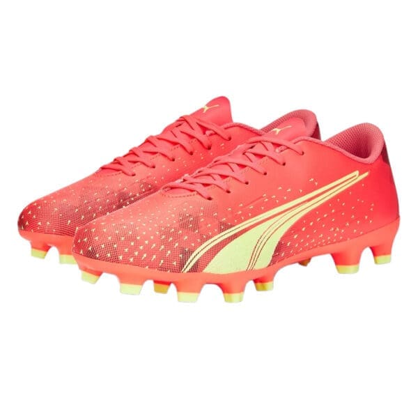 Pink and yellow Puma soccer cleats.