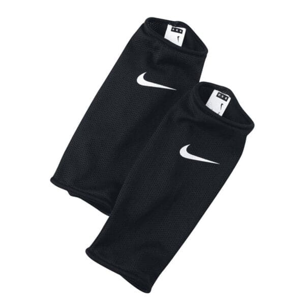 Pair of black Nike shin guards.