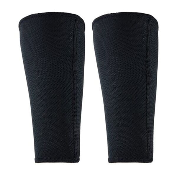 Pair of black shin guards for sports.