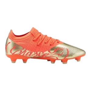 Orange and gold soccer cleats.