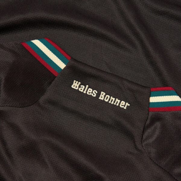 Black Wales Bonner shirt with stripes.