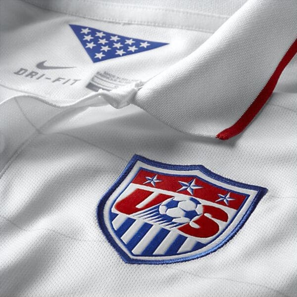 White soccer jersey with US crest.