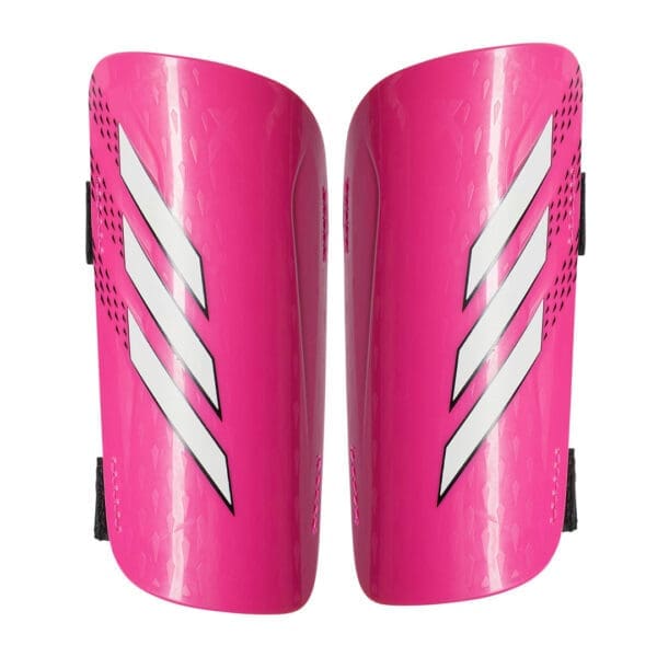 Pink and white Adidas shin guards.