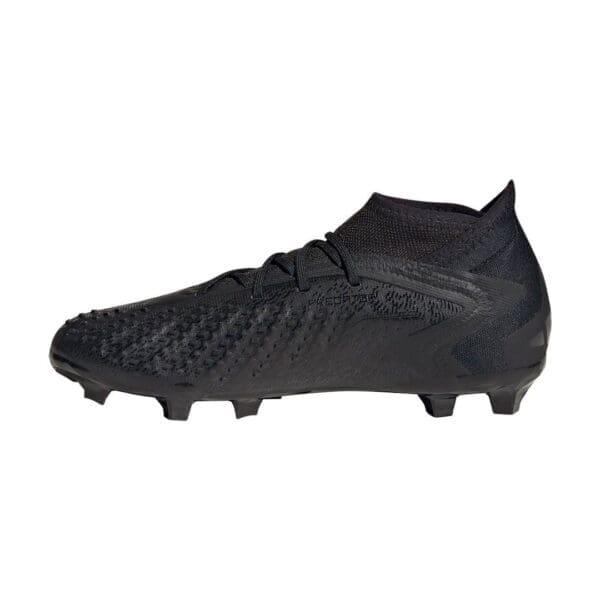 Black Adidas Predator football boots.