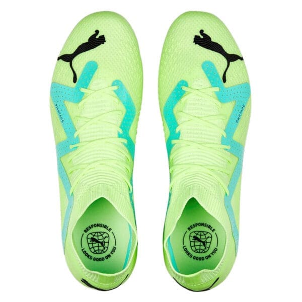 Lime green Puma football boots, top view.