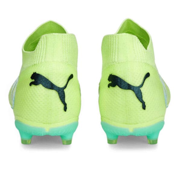 Yellow Puma soccer cleats with black logo.