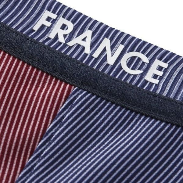 Close-up of a striped shirt with "France" written on it.