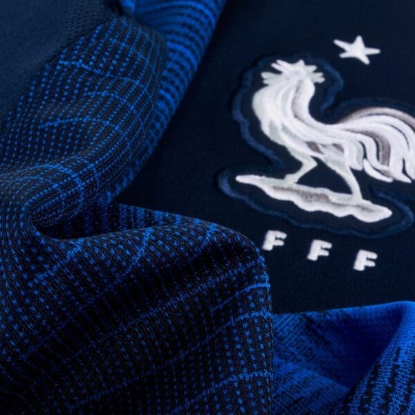 France soccer jersey with rooster logo.