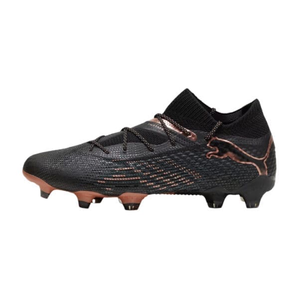 Black and rose gold Puma football boots.