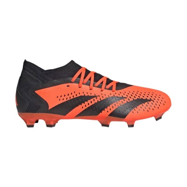 Black and orange Adidas soccer cleats.