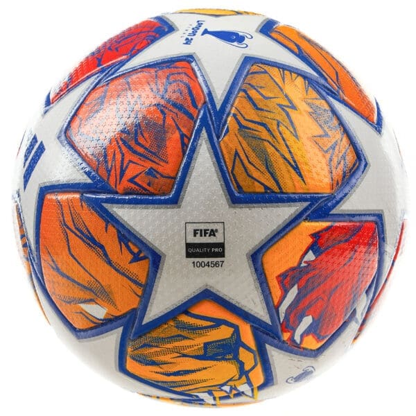 White and orange soccer ball with star.