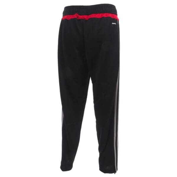 Black Adidas sweatpants with red stripe.