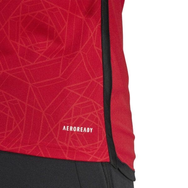 Red and black Adidas Aeroready shirt.