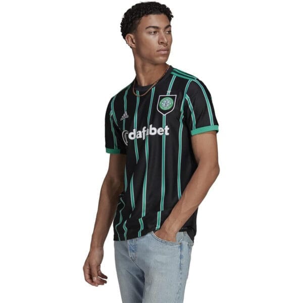 Man wearing Celtic soccer jersey