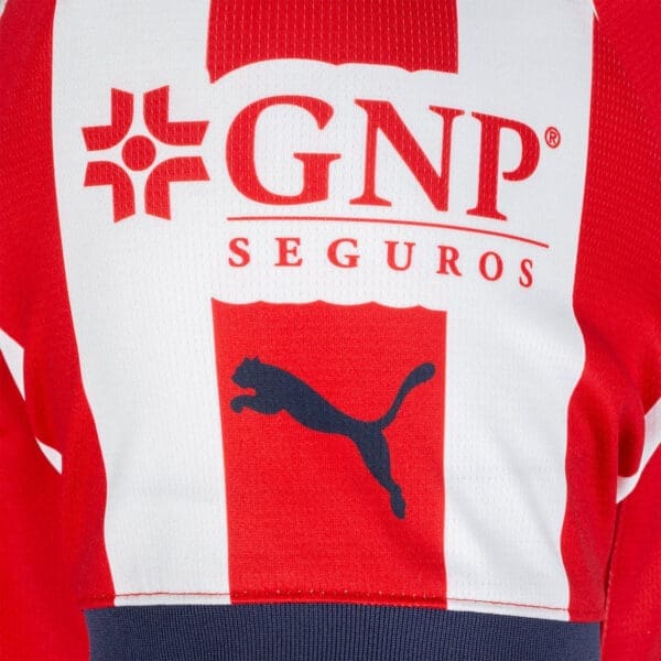 Red and white soccer jersey with GNP logo.