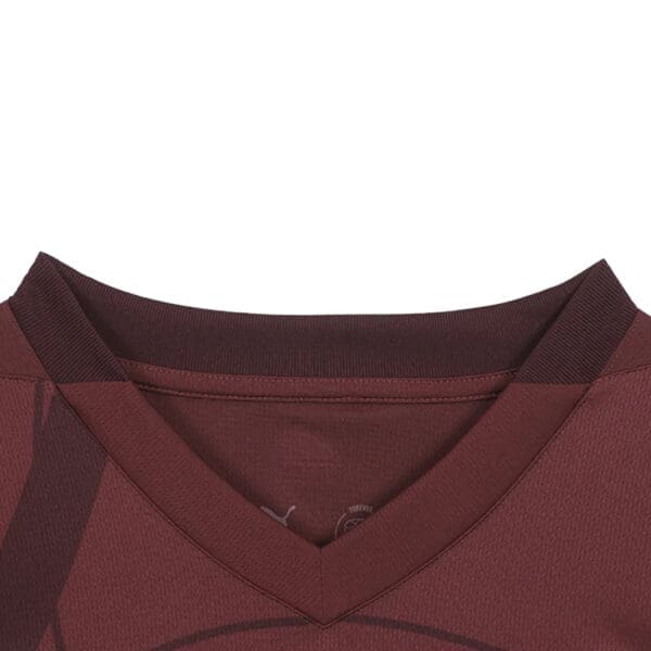 Burgundy v-neck soccer jersey closeup