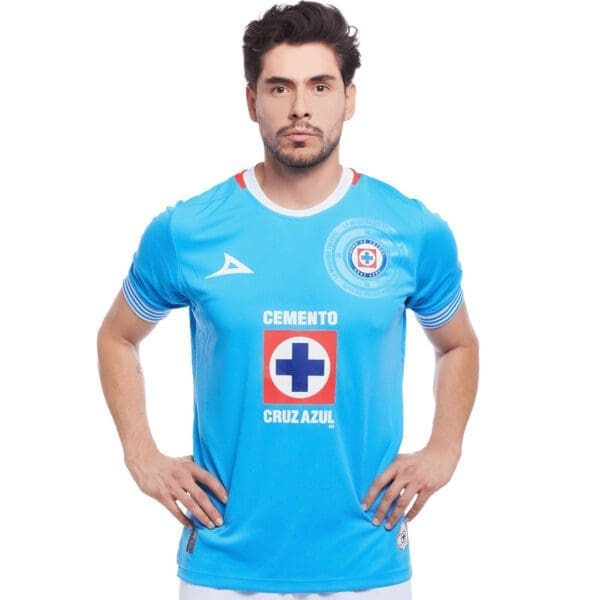 Man wearing a blue Cruz Azul jersey.