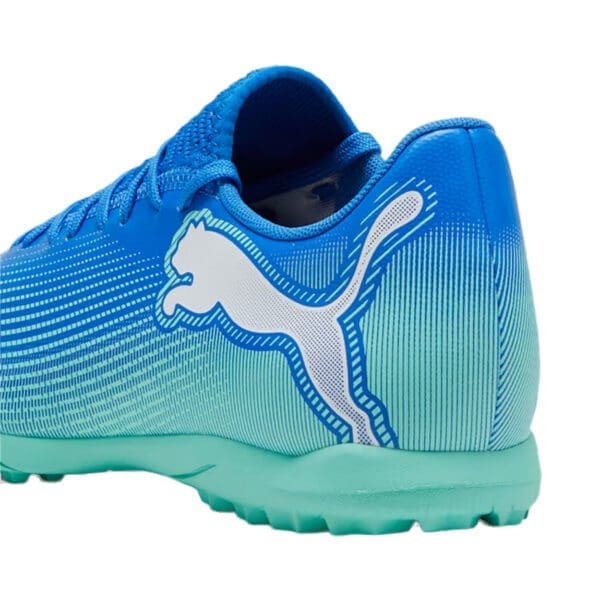 Blue and green Puma football shoe.