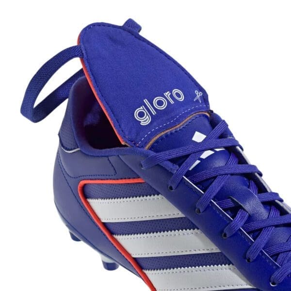 Blue and white adidas soccer cleats.