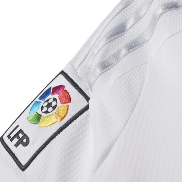 White soccer jersey with La Liga patch.