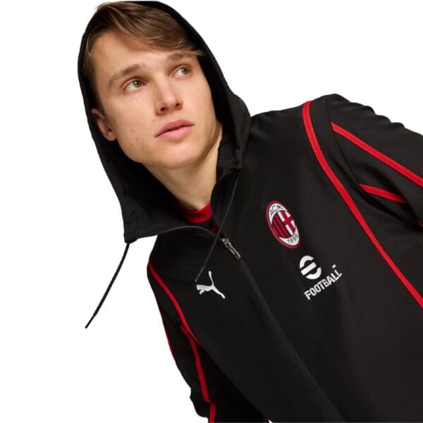 Black AC Milan Puma football jacket.