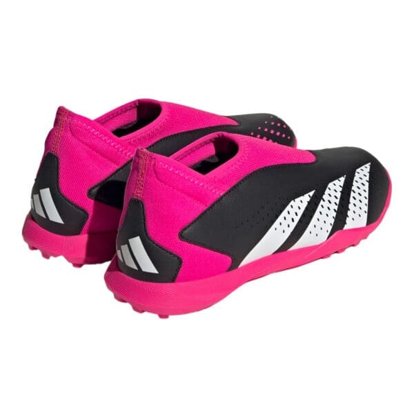 Pink and black Adidas football boots.