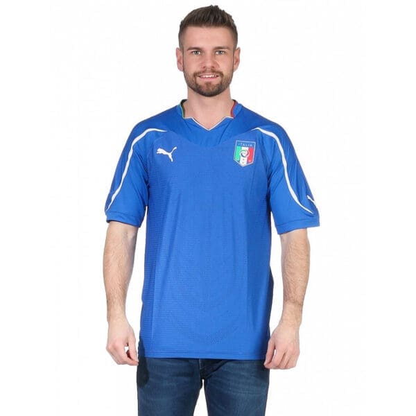 Man wearing a blue Italy soccer jersey.