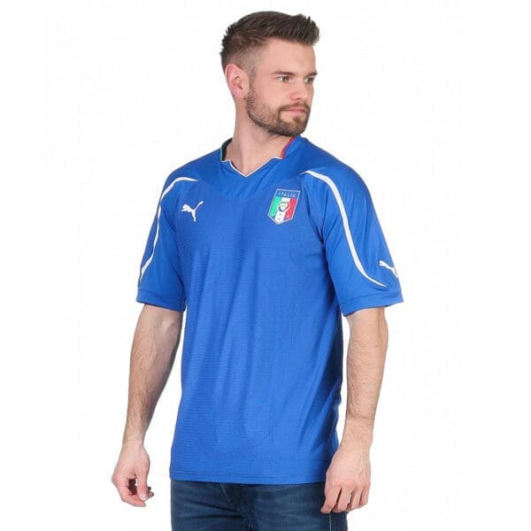 Man wearing a blue Italian soccer jersey.