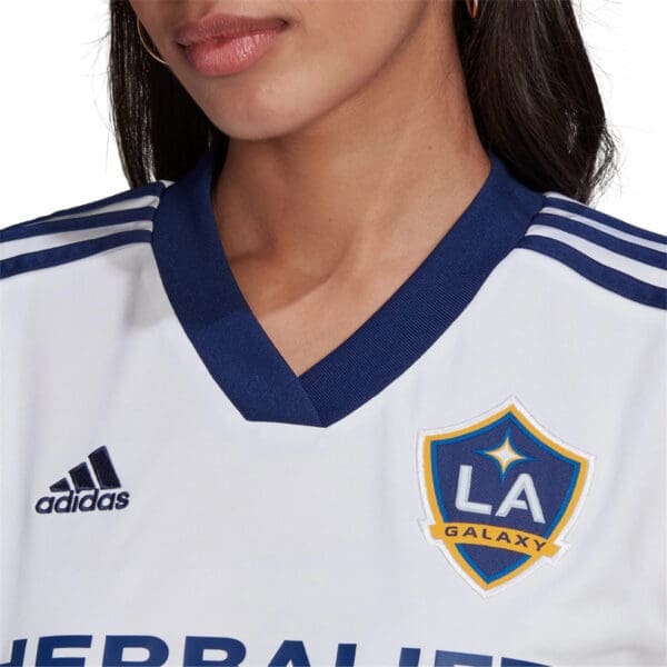 White Adidas LA Galaxy soccer jersey.