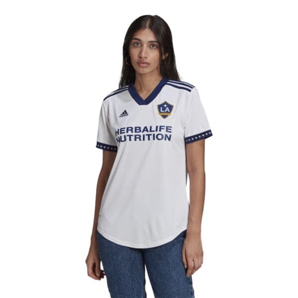 Woman wearing white LA Galaxy jersey