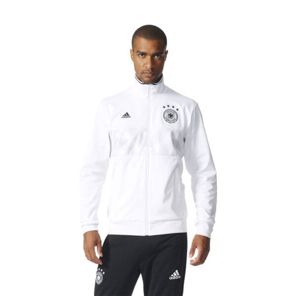 Man wearing white German Adidas jacket.