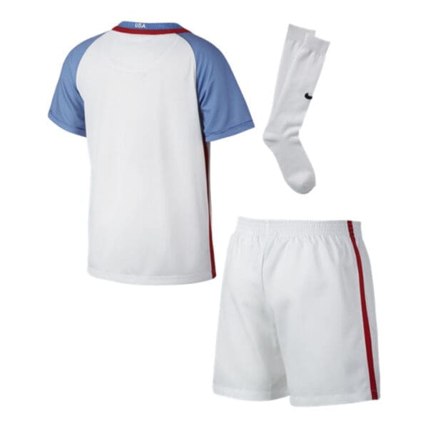 White soccer jersey, shorts, and socks.