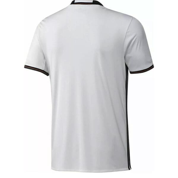 White soccer jersey with black and red trim.